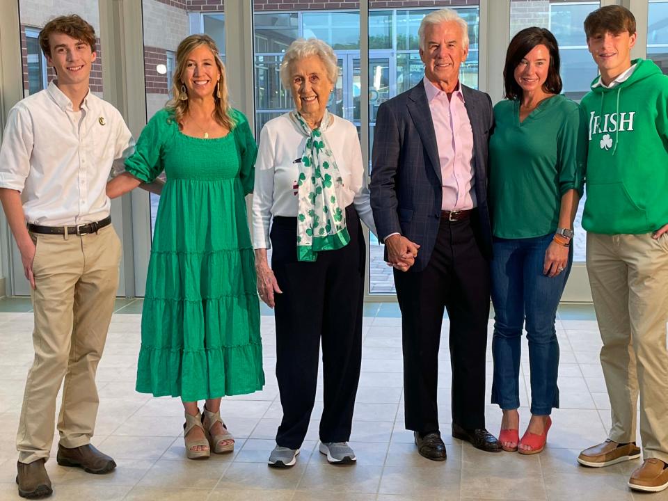 Four generations of the Connor family gather in the Mike and Carol Connor Lobby to celebrate the 90th school year at Knoxville Catholic High School Tuesday, Aug. 9, 2022. From left: Patton Watkins (Class of ’23), Christy Connor Watkins (Class of ’89), Helen Marie Mabry Connor (Class of ’45), Mike Connor (Class of ’69), Mandy Connor Welch (Class of ’98), and Connor Welch (Class of ’26).