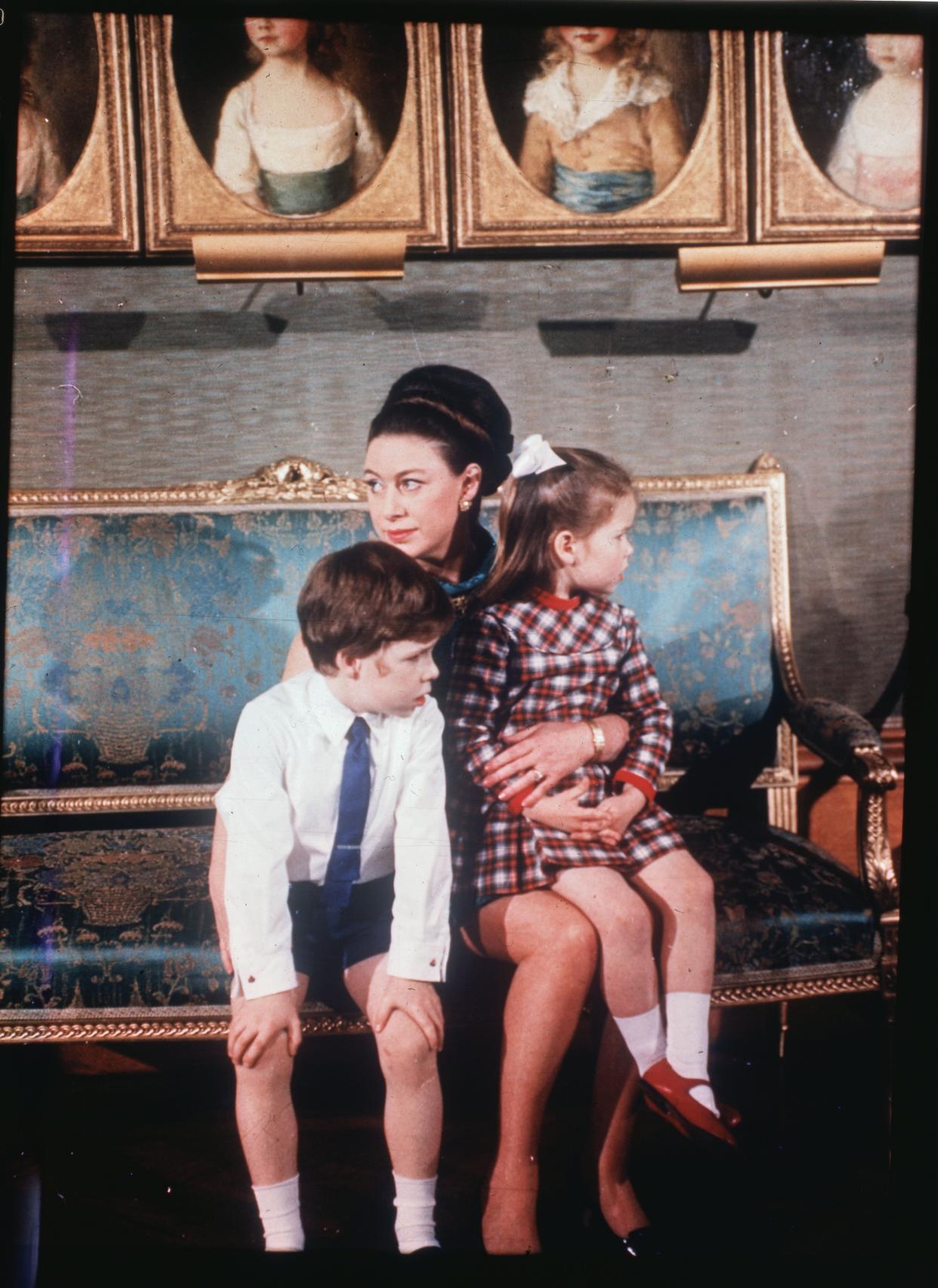 Princess Margaret is shown here with her two children, Viscount Linley and Lady Sarah Armstrong-Jones, at Windsor Castle during filming of "The Royal Family." (Photo: Bettmann via Getty Images)