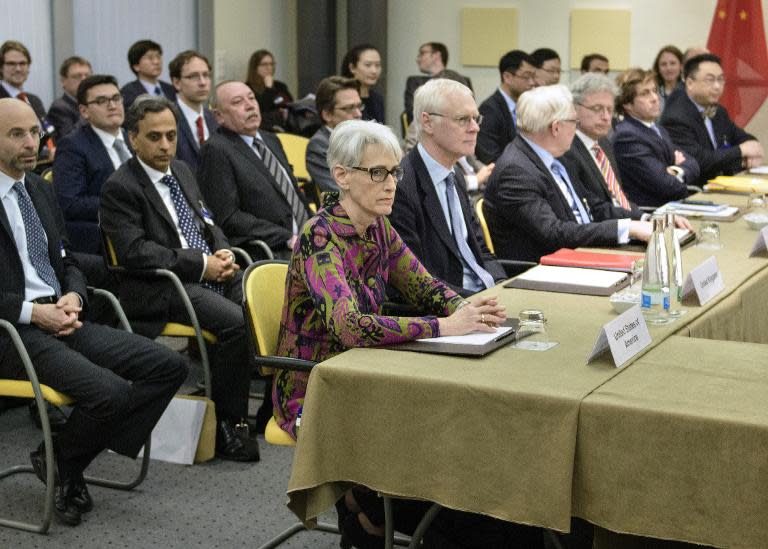 US Under Secretary for Political Affairs Wendy Sherman (L) waits with others ahead of a meeting of "P5+1" political directors at the Beau Rivage Palace Hotel in Lausanne on March 26, 2015