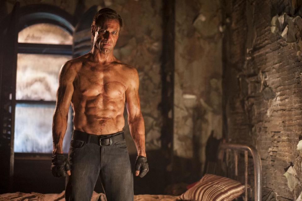 This image released by Lionsgate shows Aaron Eckhart in a scene from the film, "I, Frankenstein." The PG-13 monster thriller "I, Frankenstein" will attempt to capitalize on a football-free weekend and try to unseat box-office leader "Ride Along," the Kevin Hart comedy. (AP Photo/Lionsgate, Ben King)