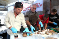 <p>Back in 2019, McConaughey partnered with the disaster relief organization Operation BBQ Relief and Wild Turkey Bourbon to cook, prepare and deliver meals to first responders <a href="https://people.com/human-interest/how-to-help-california-wildfires-victims/" rel="nofollow noopener" target="_blank" data-ylk="slk:as multiple wildfires raged across" class="link ">as multiple wildfires raged across</a> his "second home" of California.</p> <p>McConaughey kicked off the bourbon brand's annual <a href="https://www.instagram.com/p/B4V8iZEl0xi/" rel="nofollow noopener" target="_blank" data-ylk="slk:&quot;With Thanks&quot; campaign" class="link ">"With Thanks" campaign</a> in Los Angeles <a href="https://people.com/human-interest/matthew-mcconaughey-first-responders-meals-california-fires/" rel="nofollow noopener" target="_blank" data-ylk="slk:by making BBQ turkey dinners for firefighters and other first responders battling the flames in southern California" class="link ">by making BBQ turkey dinners for firefighters and other first responders battling the flames in southern California</a>, and personally thanking them for their hard work.</p> <p>The Oscar winner helped put together 800 dinners, which were delivered to more than 20 fire stations. An additional 800 meals were also prepared for local homeless shelters.</p>