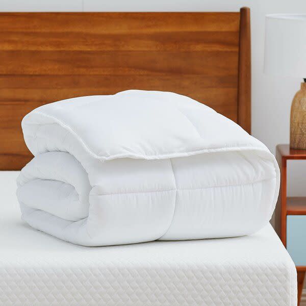 <p><strong>Latitude Run</strong></p><p>wayfair.com</p><p><strong>$23.58</strong></p><p>Next up is a down alternative quilt that doubles as a comforter or duvet insert, whichever you prefer. It has box stitching to allow the filling to be evenly distributed and four corner tabs to keep it in place when used as a duvet. And the price simply can't be beat! </p>