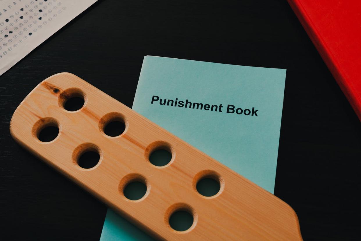 <span class="caption">At least 92,000 K-12 students in the U.S. were paddled or spanked at school in the 2015-2016 school year.</span> <span class="attribution"><a class="link " href="https://www.gettyimages.com/detail/photo/punishment-book-wooden-paddle-for-spanking-on-royalty-free-image/1250709739?adppopup=true" rel="nofollow noopener" target="_blank" data-ylk="slk:dannikonov/iStock via Getty Images Plus;elm:context_link;itc:0;sec:content-canvas">dannikonov/iStock via Getty Images Plus</a></span>