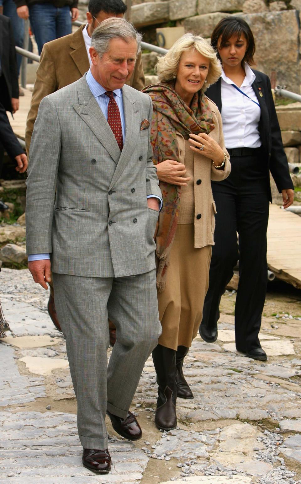 EPHESUS, TURKEY - NOVEMBER 27:  Camilla, Duchess of Cornwall and Prince Charles, Prince of Wales tour the library of Celsus built in AD 125 during a tour of the historical site of Ephesus on day two of a four day tour of Turkey on November 27, 2007 in Ephesus, Turkey. The Royal couple&#39;s tour will take in many historic and cultural sites.  (Photo by Chris Jackson/Getty Images)