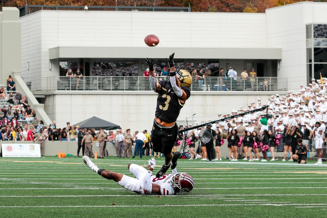 West York's Ay'Jaun Marshall was a versatile player who caught passes and gained yards on the ground while playing for Army. Here, he catches a pass in a loss to UMass this season.