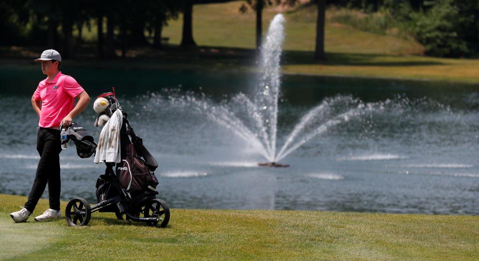 Faith Christian Bentley Carter rests during the IHSAA boys golf regional, Friday, June 9, 2023, at Coyote Crossing Golf Course in West Lafayette, Ind. 