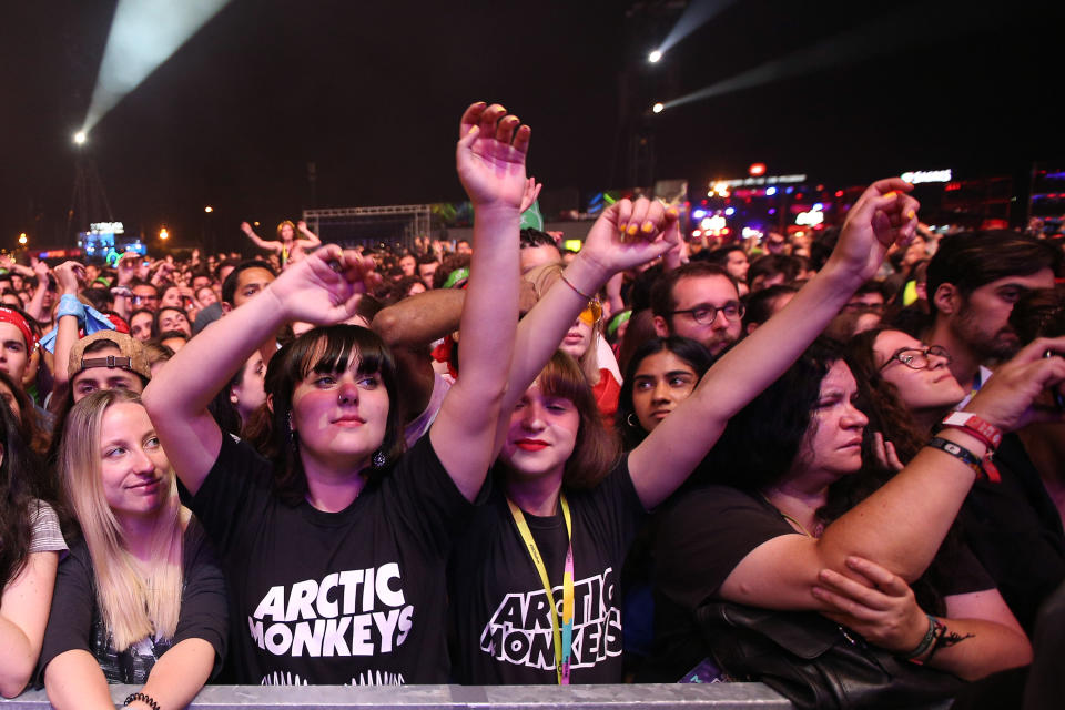 Fans of the British rock band Arctic Monkeys during their concert at the NOS Alive 2018 music festival in Lisbon, Portugal, on July 12, 2018. ( Photo by Pedro Fiúza/NurPhoto via Getty Images)