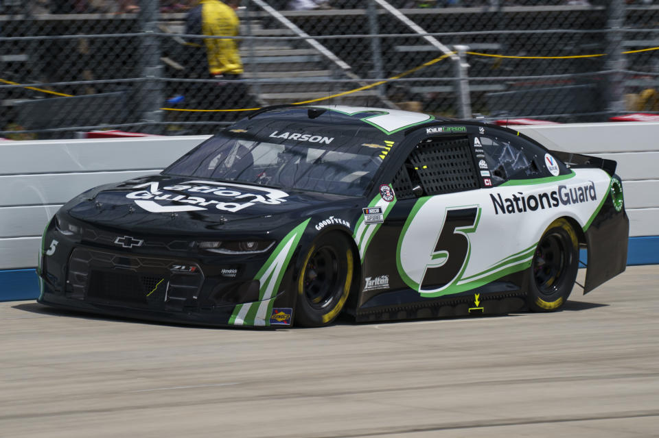 Kyle Larson rounds the track during a NASCAR Cup Series auto race at Dover International Speedway, Sunday, May 16, 2021, in Dover, Del. (AP Photo/Chris Szagola)