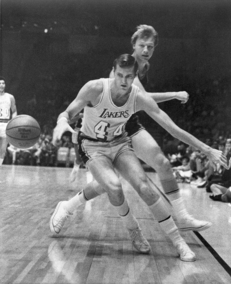 Jerry West steals the ball from Baltimore Bullets' Jack Marin on Nov. 24, 1969, at the Forum.