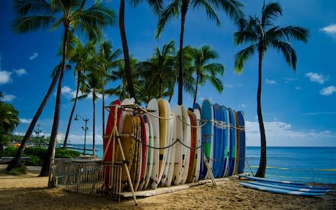 Surfboards on beahc, Oahu, Hawaii - Credit: iStock