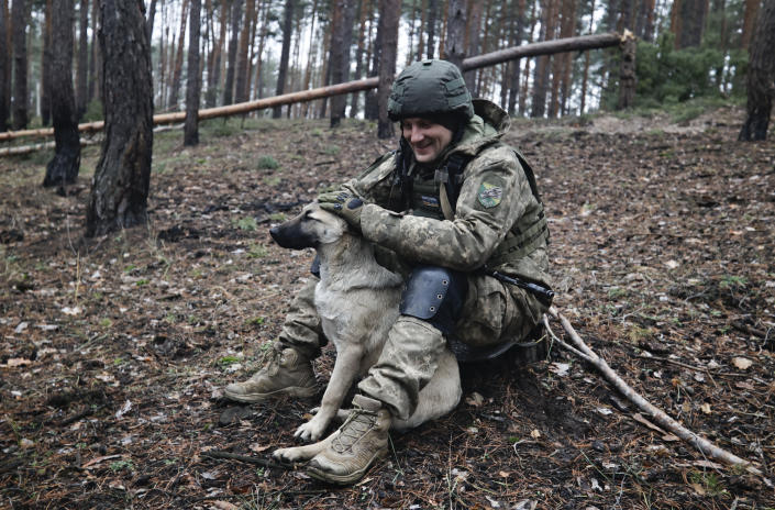 A Ukrainian serviceman take a rest on the frontline at an undisclosed location in the Donetsk region, Ukraine, Saturday, Nov. 26, 2022. (AP Photo/Roman Chop)