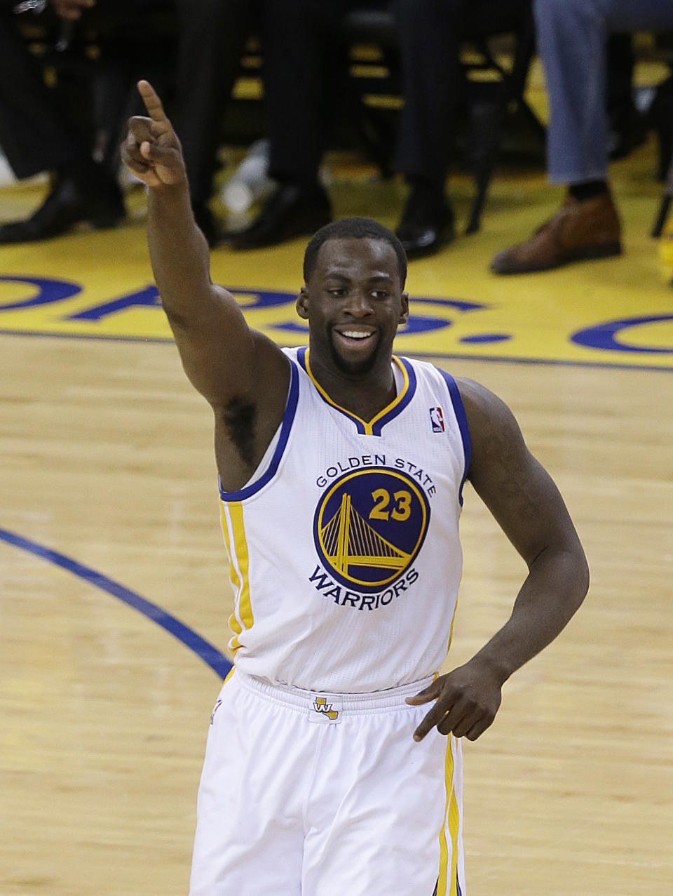 Golden State Warriors small forward Draymond Green (23) gestures after making a basket against the Los Angeles Clippers during the second half of Game 6 of an opening-round NBA basketball playoff series in Oakland, Calif., Thursday, May 1, 2014. The Warriors won 100-99. (AP Photo/Jeff Chiu)