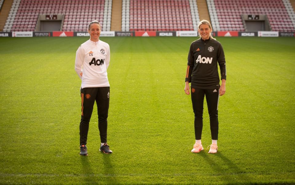 Alessia Russo stands alongside Manchester United manager Casey Stoney - GETTY IMAGES