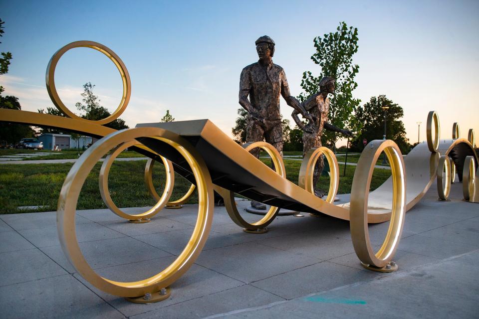 Water Works' River to River sculpture, designed by artist Gail Folwell, at Water Works Park in Des Moines. The bronze sculpture honors RAGBRAI founders Kaul and John Karras.