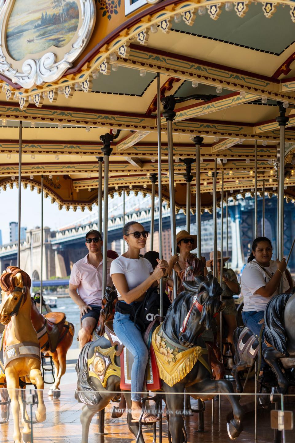 Ride the carousel at the Brooklyn Bridge Park