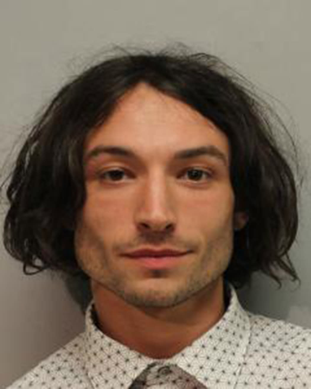 HILO, HAWAII - MARCH 28: (EDITORS NOTE: Best quality available) In this handout image provided by  Hawaiʻi Police Department, Ezra Miller is seen in a police booking photo after his arrest for disorderly conduct and harassment on March 28, 2022 in Hilo, Hawaii. (Photo by Hawaiʻi Police Department via Getty Images)