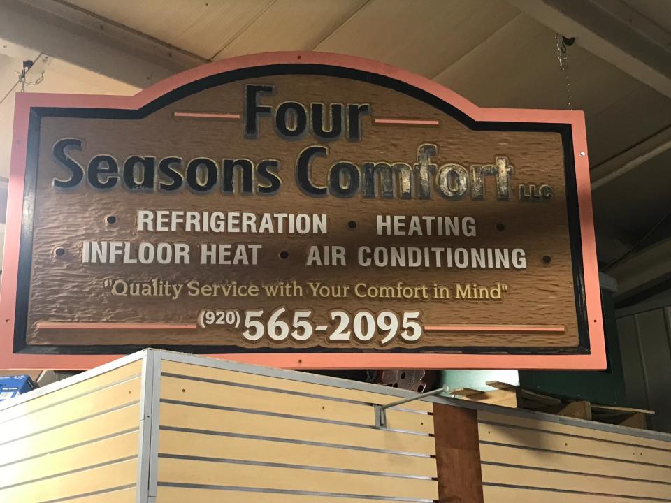 A sign for Four Seasons Comfort LLC.