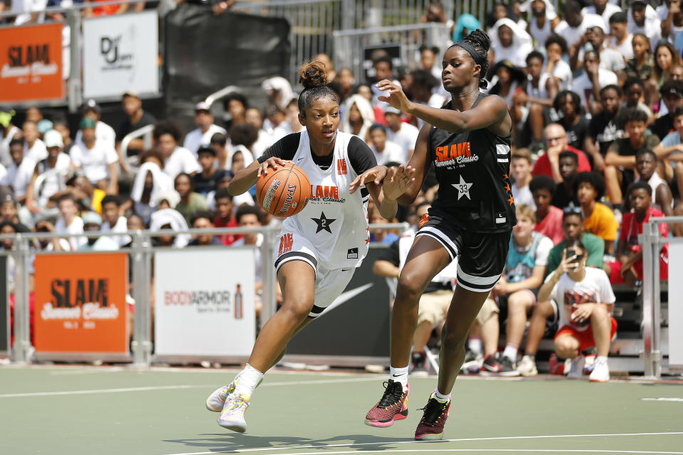 NEW YORK, NEW YORK - AUGUST 18:  Angel Reese #2 drives to the basket during the SLAM Summer Classic 2019 girls game at Dyckman Park on August 18, 2019 in New York City. (Photo by Michael Reaves/Getty Images)