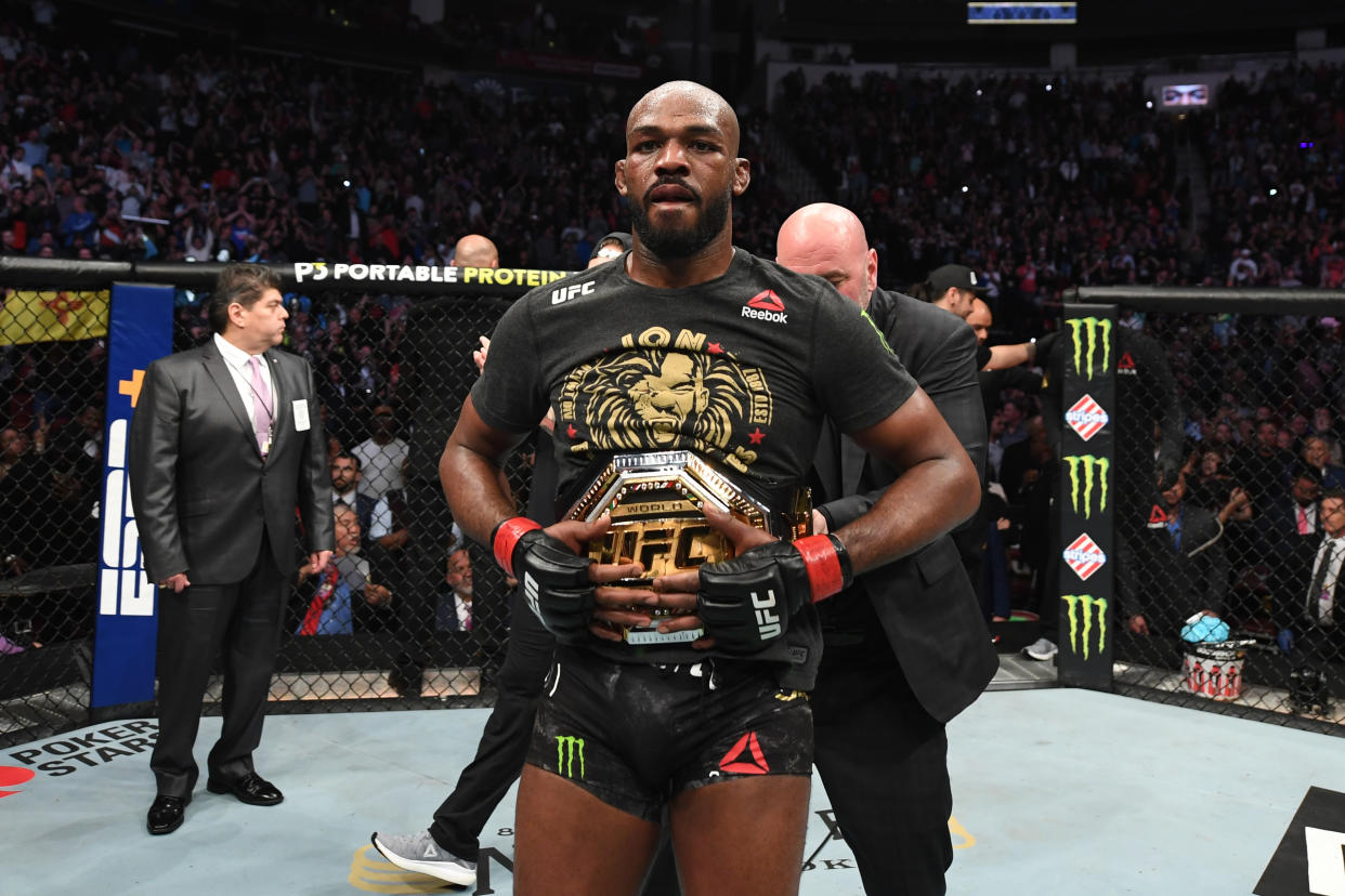 HOUSTON, TEXAS - FEBRUARY 08:  Jon Jones celebrates his victory over Dominick Reyes in their light heavyweight championship bout during the UFC 247 event at Toyota Center on February 08, 2020 in Houston, Texas. (Photo by Josh Hedges/Zuffa LLC via Getty Images)