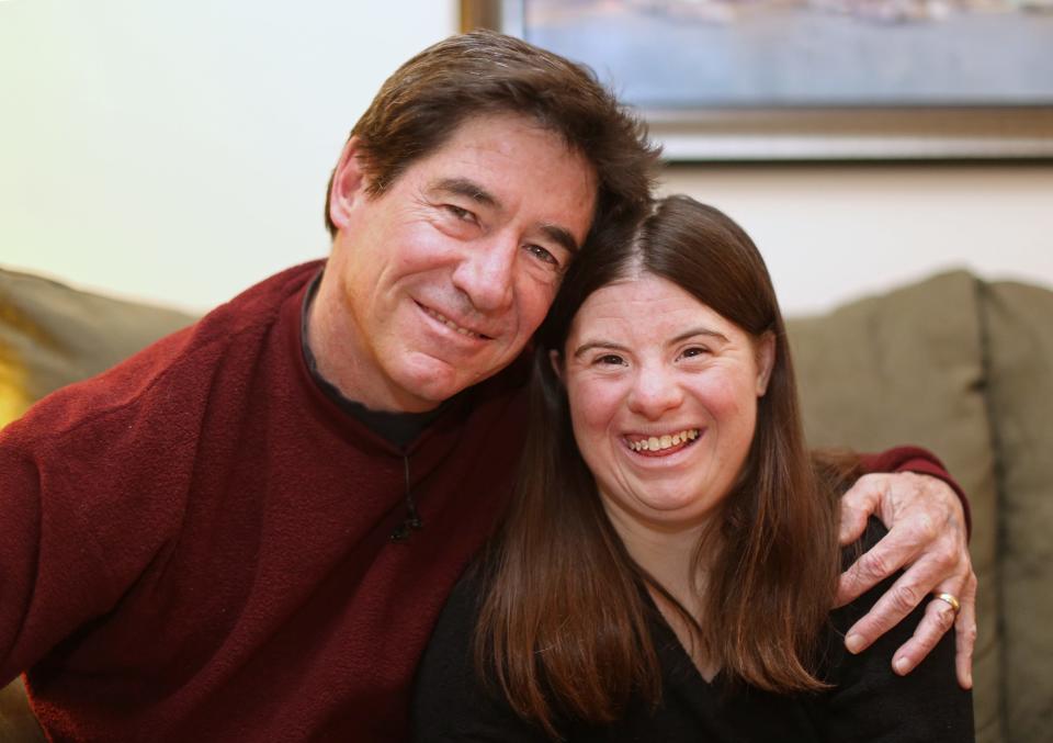 Paul Daugherty with his daughter, Jillian, when she was 25 in 2015. 2015 was the year that Daugherty's memoir, "An Uncomplicated Life," about Jillian, who has Down syndrome. was published.