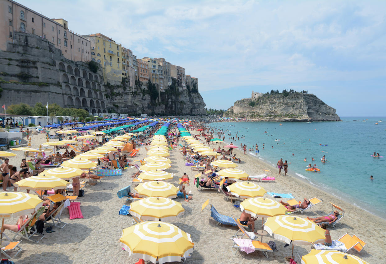 The beautiful beach at Tropea is a hit with Spanish families. (Getty Images)