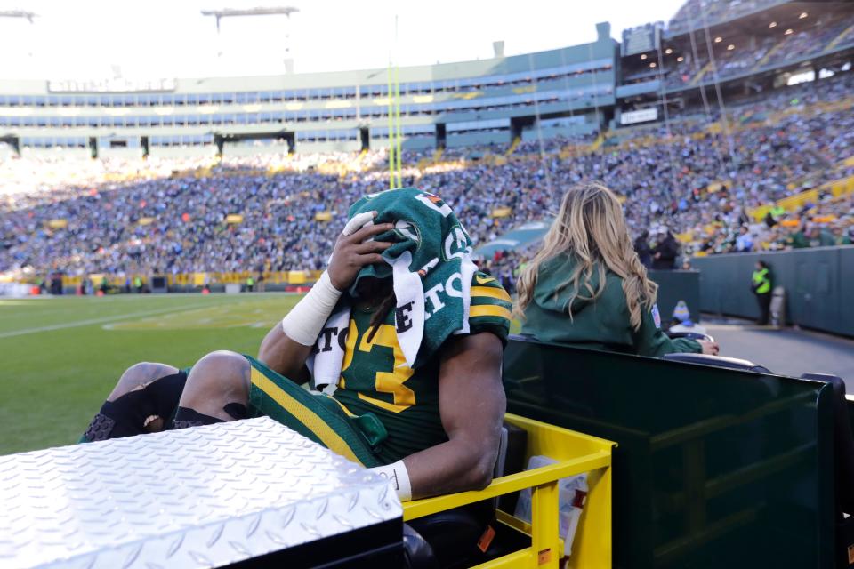 Green Bay Packers running back Aaron Jones (33) is carted off the field after getting injured in the second quarter againsst the Los Angeles Chargers during their football game Sunday, November 19, 2023, at Lambeau Field in Green Bay, Wis. 

Dan Powers/USA TODAY NETWORK-Wisconsin.