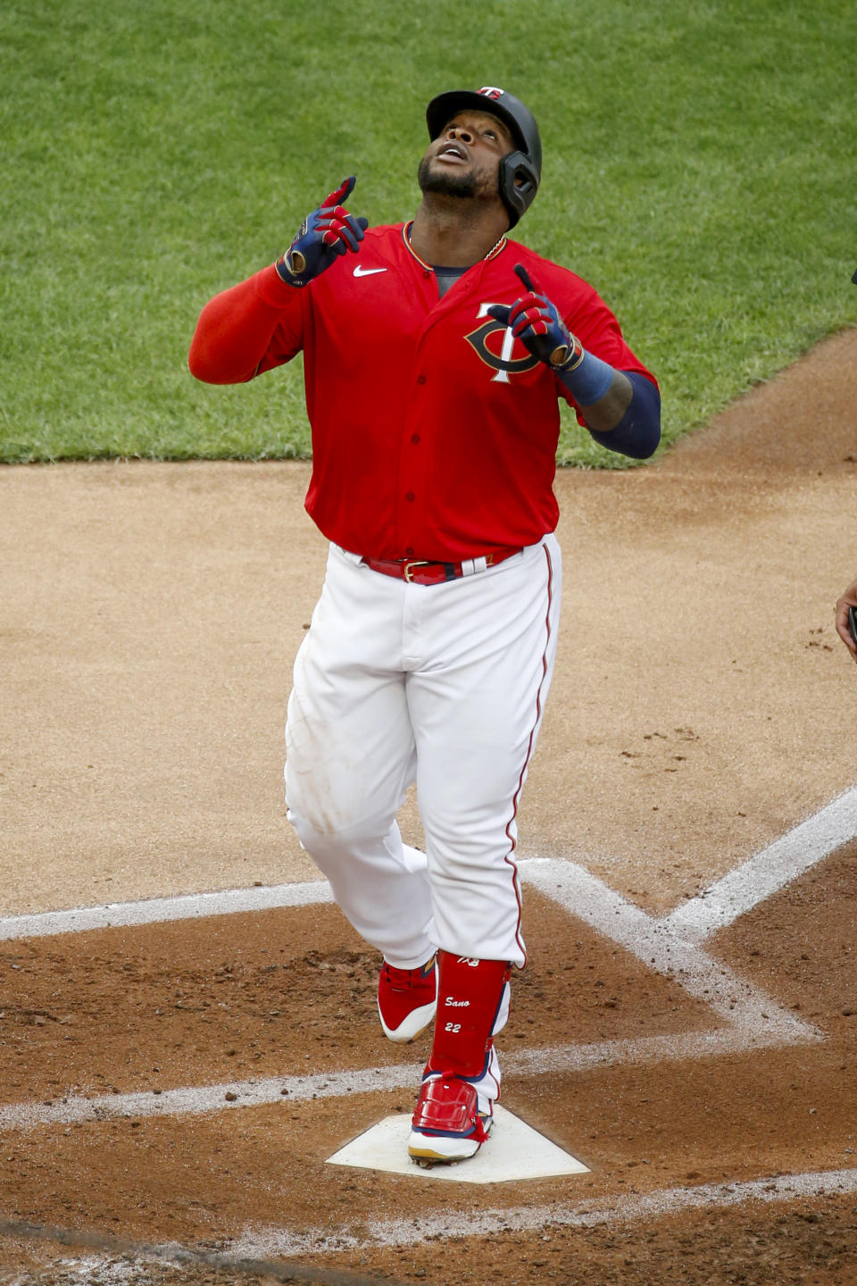 Minnesota Twins' Miguel Sano celebrates his solo home run against the Cleveland Indians in the third inning of a baseball game Saturday, Aug. 1, 2020, in Minneapolis. (AP Photo/Bruce Kluckhohn)