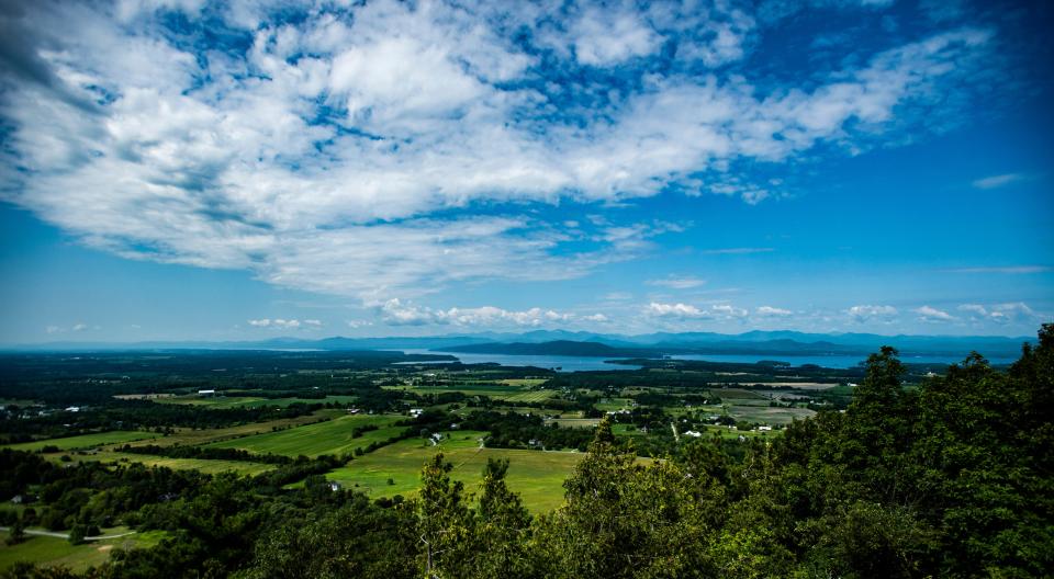 The peak of Mount Philo offers sweeping views of the Champlain Valley and across Lake Champlain into New York like this seen July 25, 2019.