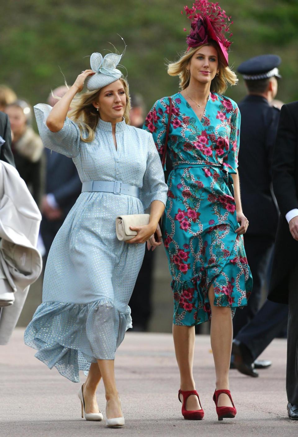 Ellie Goulding holds onto her hat as she arrives (PA Wire/PA Images)