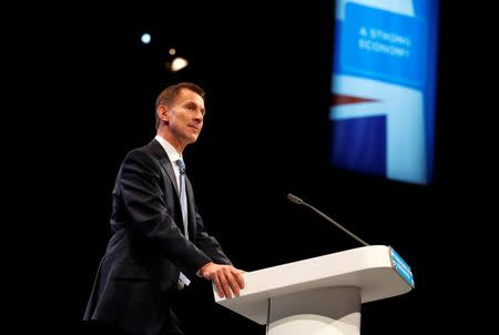 Britain's Health Secretary Jeremy Hunt speaks at the Conservative Party conference in Manchester, Britain October 3, 2017. REUTERS/Hannah McKay/Files