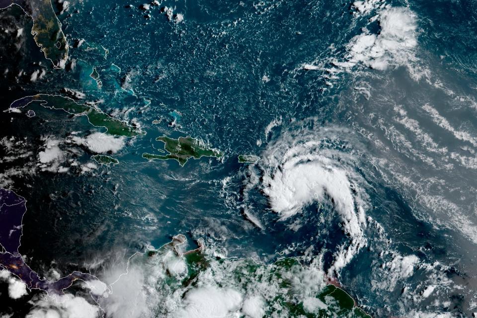 This satellite image provided by the National Oceanic and Atmospheric Administration shows Tropical Storm Fred near Puerto Rico late Tuesday.