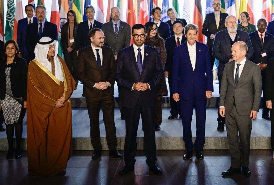 Sultan Al Jaber, center, among participants including German Chancellor Olaf Scholz and U.S. Climate Envoy John Kerry, at the Petersberg Climate Dialogue at the Foreign Office in Berlin, on May 3, 2023.<span class="copyright">Jon MacDougall—AFP/Getty Images</span>