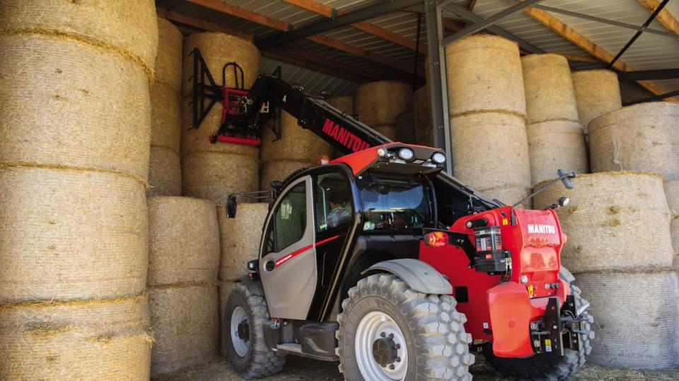 A telehandler, moving hay bales, similar to the one the man was using when he was fatally electrocuted. Picture: Supplied