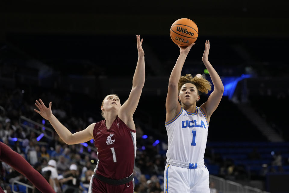 UCLA guard Kiki Rice, right, looks to shoot against Washington State guard Tara Wallack, left, during the second half of an NCAA college basketball game, Sunday, Jan. 28, 2024, in Los Angeles. (AP Photo/Ryan Sun)