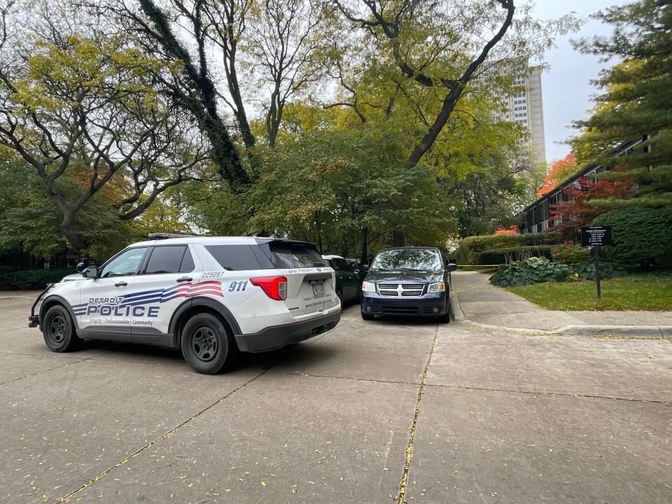 Police tape blocks the sidewalk in Detroit on Saturday, Oct. 21, 2023, near where a woman was found stabbed to death.