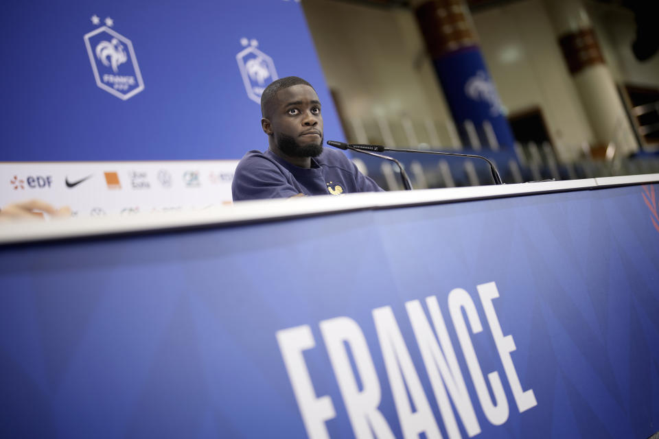 France's Dayot Upamecano answers questions during a press conference at the Jassim Bin Hamad stadium in Doha, Qatar, Thursday, Dec. 8, 2022. France will play against England during their World Cup quarter-final soccer match on Dec. 10. (AP Photo/Christophe Ena)