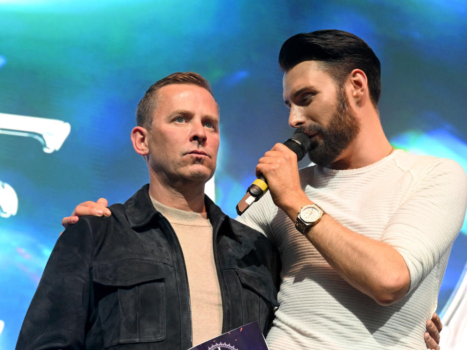 Scott Mills (L) and Rylan Clark on stage during the London Eurovision Party 2023 at the Outernet London on April 16, 2023 in London, England. (Photo by Jeff Spicer/Getty Images)