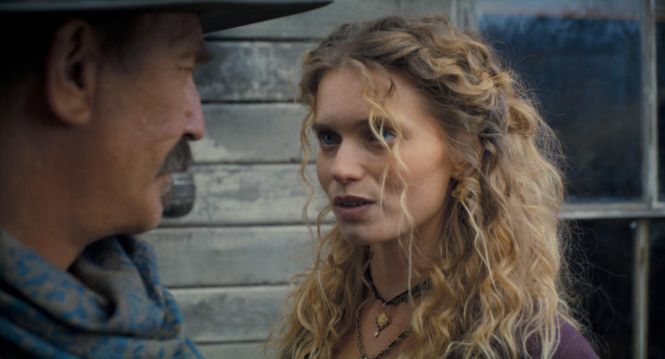 Abbey Lee's Marigold encounters Costner's Hayes<span class="copyright">Courtesy of Warner Bros. Pictures</span>