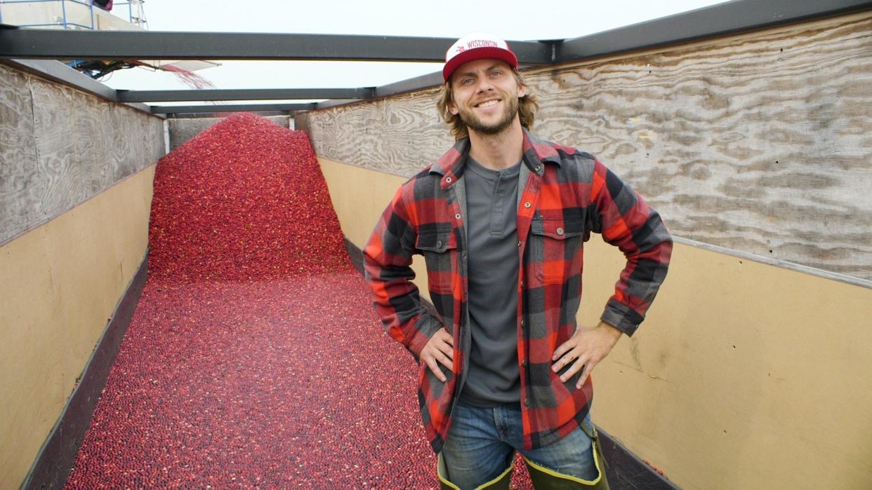 Comedian Charlie Berens gives a thumbs-up to Wisconsin cranberries.