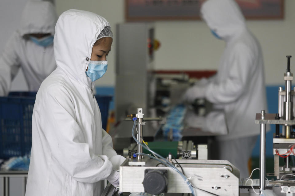 Employees of the Ryugyong Necessities Factory produce face masks in Pyongyang, North Korea, Friday, Sept. 11, 2020. (AP Photo/Jon Chol Jin)