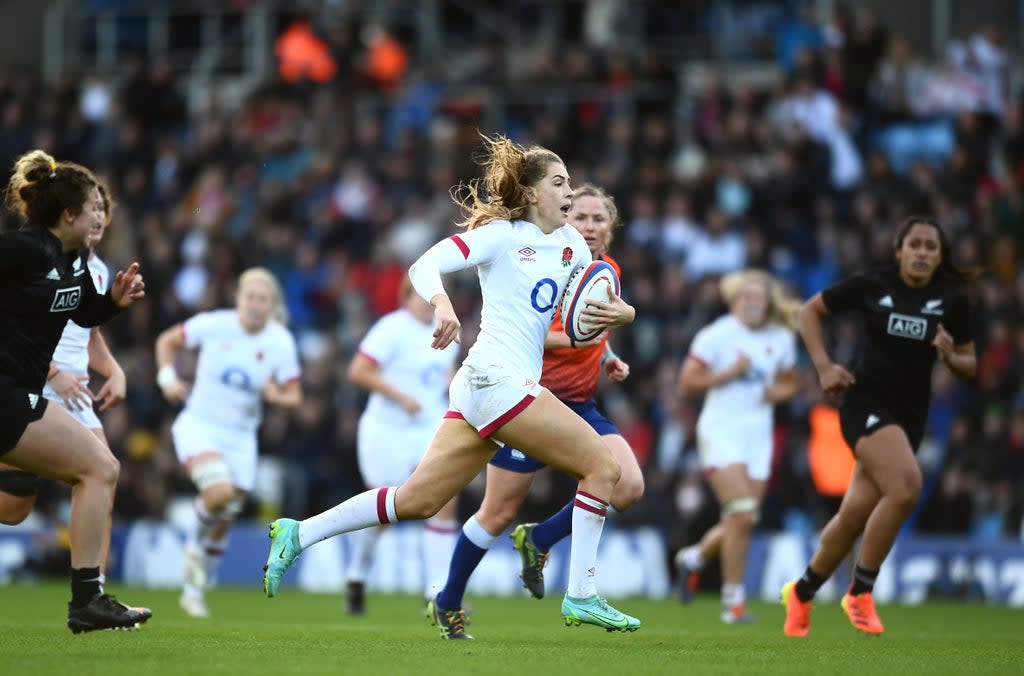 Holly Aitchison of England breaks away before scoring their side's fifth try (Getty)