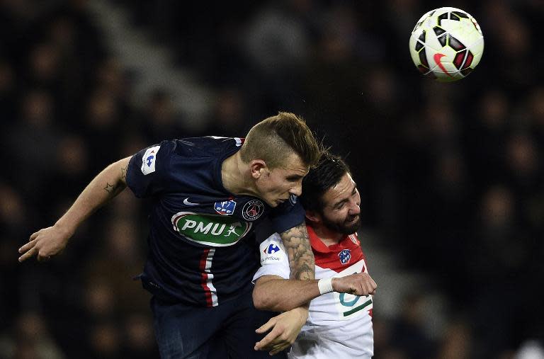 Paris Saint-Germain's French defender Lucas Digne (L) heads the ball with Monaco's Portuguese midfielder Joao Moutinho during their French Cup football match in Paris on March 4, 2015