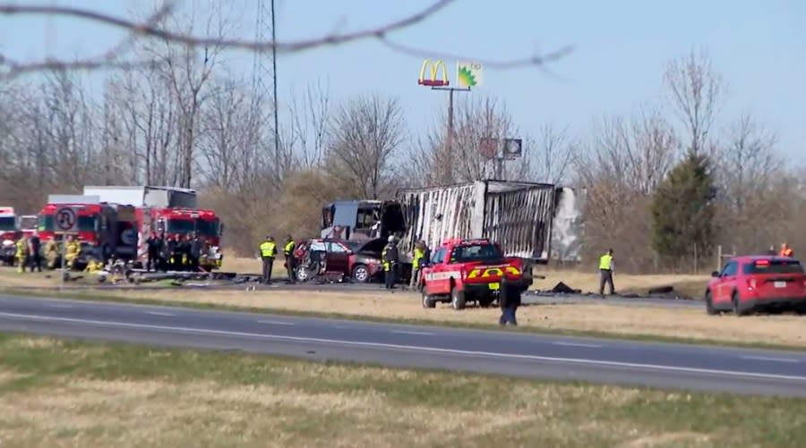 Emergency responders are on the scene of a fatal accident on Interstate 70 West in Licking County, Ohio, Tuesday, Nov. 14, 2023. An emergency official says a charter bus carrying students from a high school was rear-ended by a semi-truck on the Ohio highway. (WSYX/WTTE via AP)