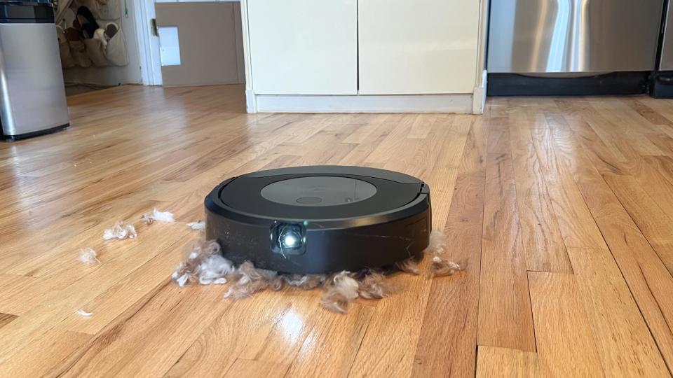 Roomba J9+ Combo robot vacuum and mop shown on floor