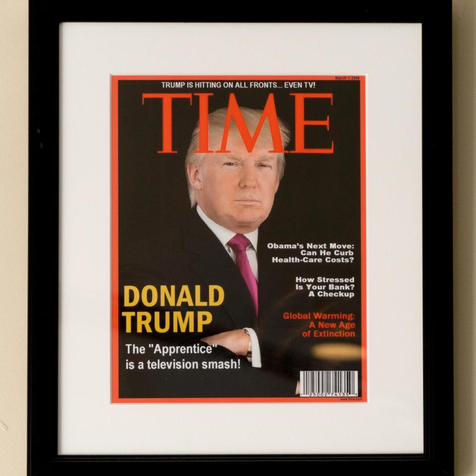 A framed fake Time Magazine cover hanging at the Trump National Doral Miami Golf Shop, in Doral, Florida on June 24, 2017 - Credit:  The Washington Post via Getty Images