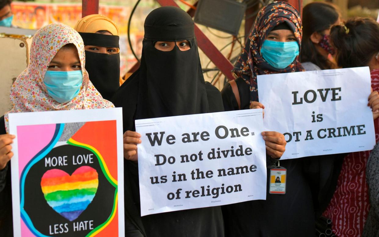 The 'Love Jihad' laws have sparked protests - AFP