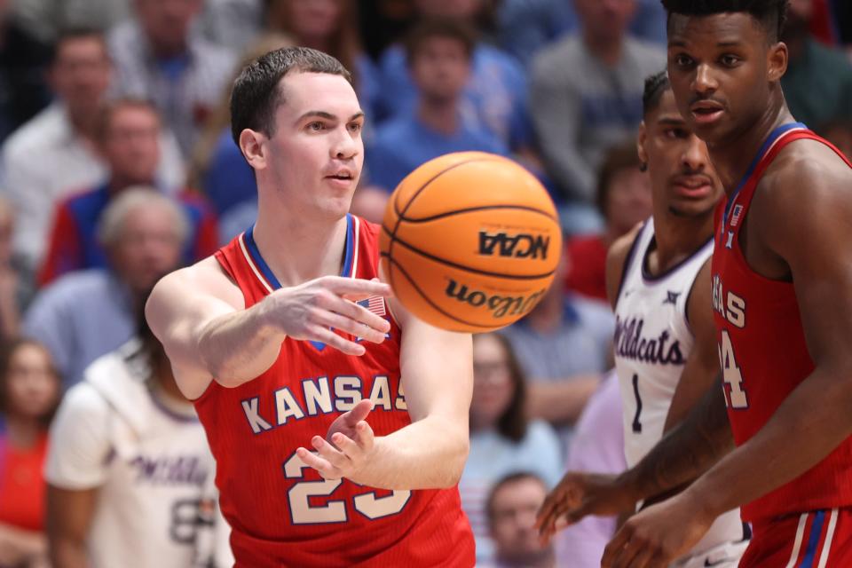 Kansas graduate senior guard Nicolas Timberlake (25) passes the ball in the second half of the Sunflower Showdown inside Allen Fieldhouse Tuesday, March 5, 2024.