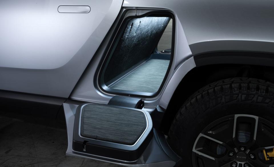 <p>Behind the cab but ahead of the bed is what Rivian calls the gear tunnel: a lockable storage compartment, also 12 cubic feet, that extends from one side of the truck to the other, with the ability to hold golf clubs, strollers, or other objects.</p>