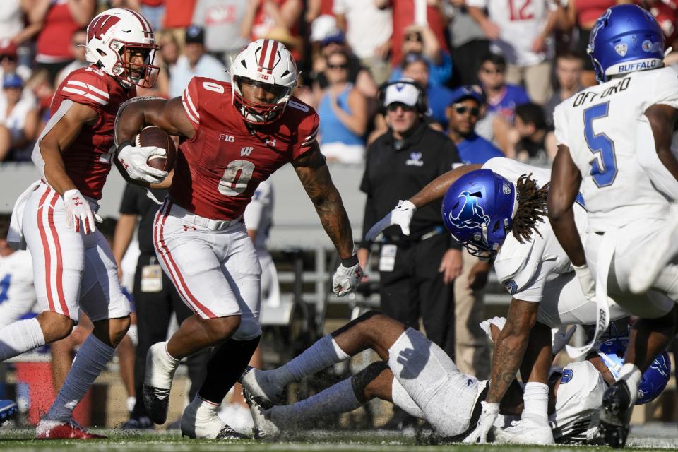 Wisconsin's Braelon Allen (0) runs during the second half of an NCAA college football game against Buffalo Saturday, Sept. 2, 2023, in Madison, Wis. (AP Photo/Morry Gash)