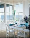 <p>There’s something serene about a white-on-white dining room. When you feel like adding color, try a splash of turquoise, such as this pair of paddles propped just so in the corner.</p> <p><b>Idea Spotlight</b></p> <p>Transform everyday objects into accents that become eye-catching works of art.</p>